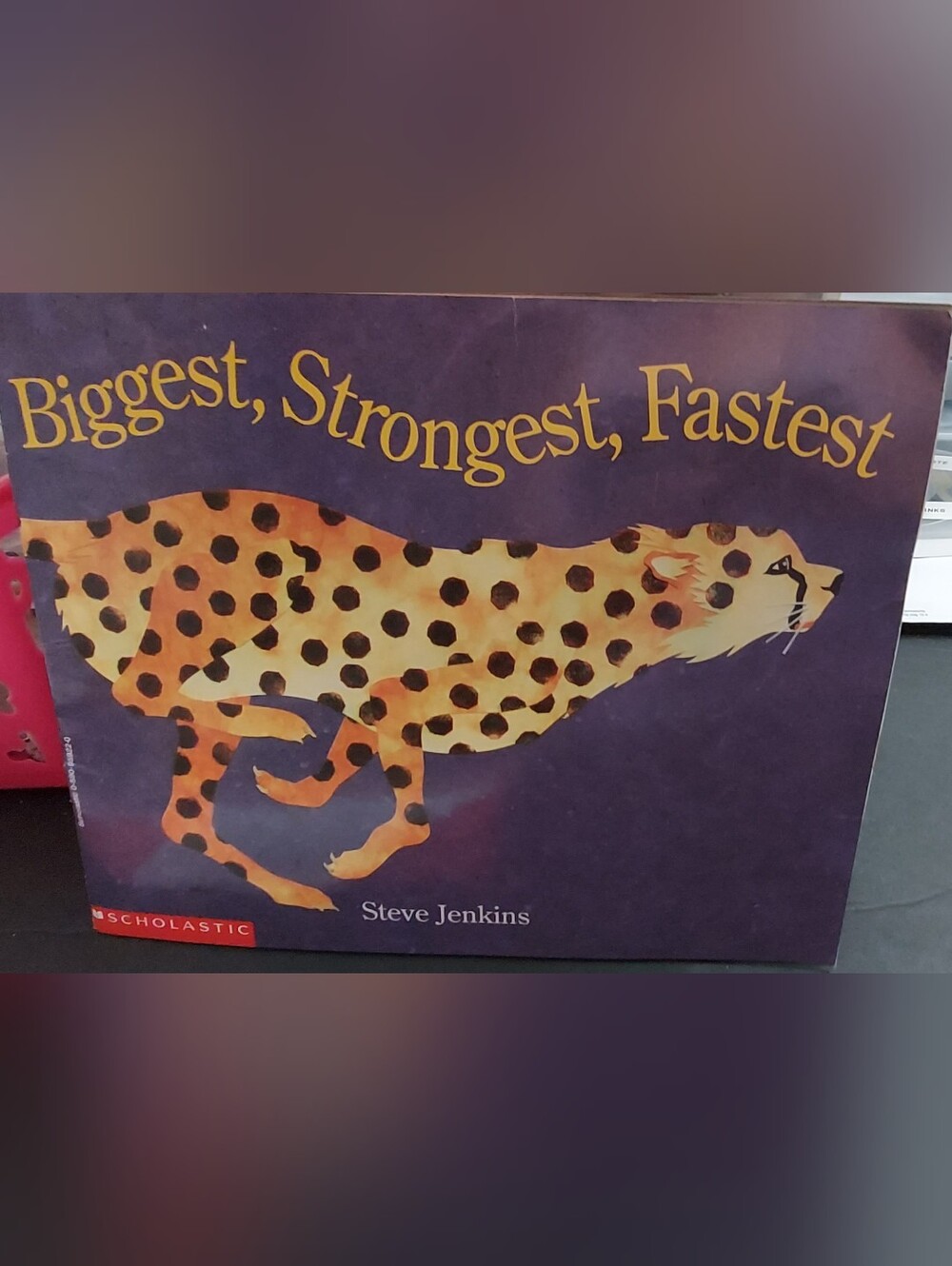 Scholastic Purple and Gold 'Biggest, Strongest, Fastest' Picture Book